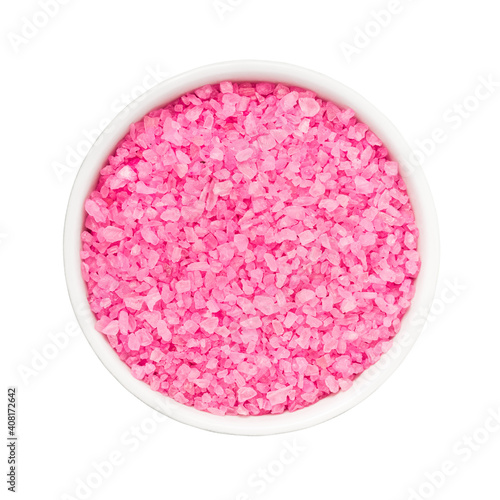 SPA concept. Bright pink bath salt in bowl isolated over white background with clipping path.