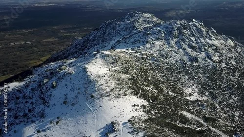 Wallpaper Mural Sierra de Guadarrama mountains landscape close to El Escorial during winter season aerial view. Awe view of recent snow covered fields on a rugged mountain terrain an a view of Madrid in far distance Torontodigital.ca