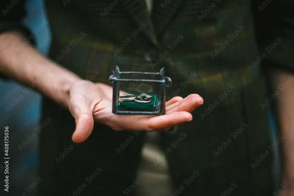 Rings in casket. In the hands of a box with rings.