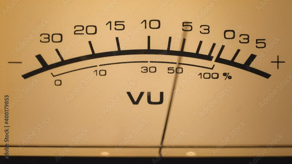 Audio signal levels monitoring audio console on classic sound amplifier. Close-up analog signal indicator with arrow Audio signal levels monitoring audio console on classic sound amplifier. Close-up analog signal indicator with arrow