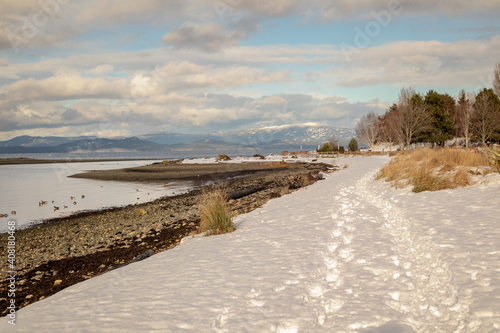 Parksville community beach in winter with snow, Vancouver Island