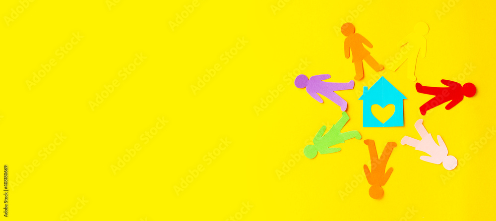 Diversity, inclusion, adoption concept. Colorful paper cut figure on yellow background. Banner Diversity, inclusion, adoption concept. Colorful paper cut figure on yellow background. Banner