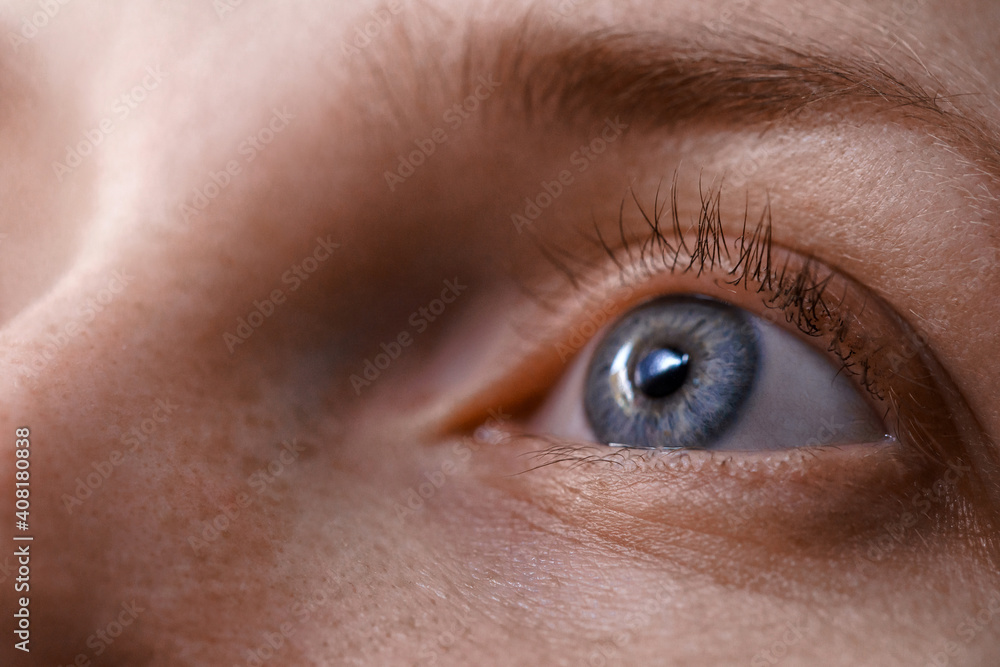 eyes of a woman close-up, macro. a girl with open eyes of a gray-blue color. Health concept in the visual center. clean eyes without makeup eyes of a woman close-up, macro. a girl with open eyes of a gray-blue color. Health concept in the visual center. clean eyes without makeup
