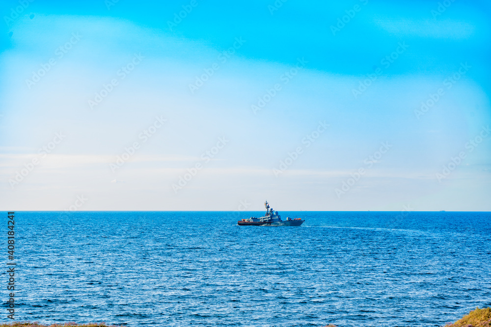 Boats and waves in the sea, hot Crimean summer Boats and waves in the sea, hot Crimean summer