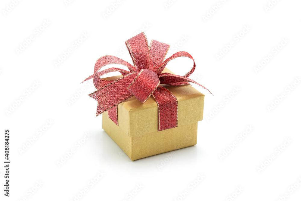 Obraz premium Gold gift box and ribbon isolated on white background, presents in valentine day or Christmas day, object in birthday or anniversary, package with wrap luxury, holiday and festive concept.