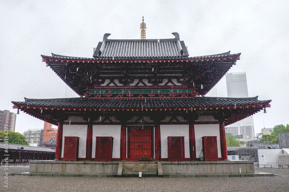 Traditional japanese temple building in a rainy day at Shitenno-ji temple, Osaka, Japan Traditional japanese temple building in a rainy day at Shitenno-ji temple, Osaka, Japan