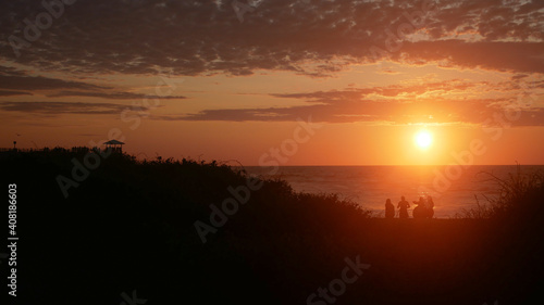 Beautiful beach of Salinas - Ecuador at sunset in summer - red sunset - La chocolatera.