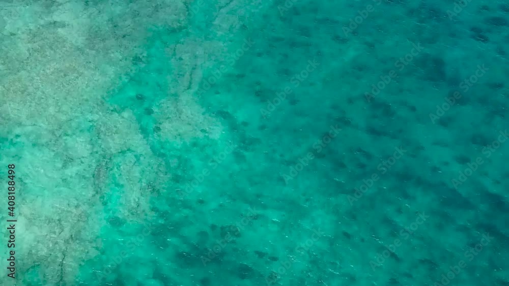 Drone aerial reef snorkel blue water beach black sand Drone aerial reef snorkel blue water beach black sand