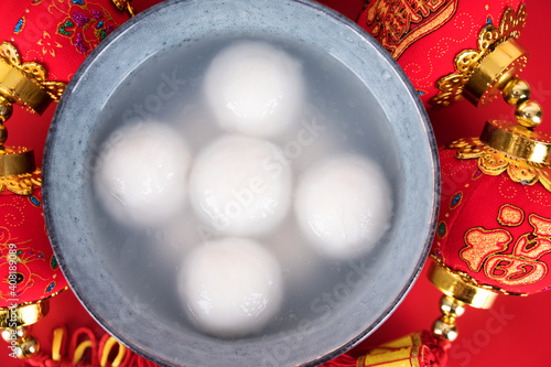 Overlooking a bowl of dumplings surrounded by lanterns photo