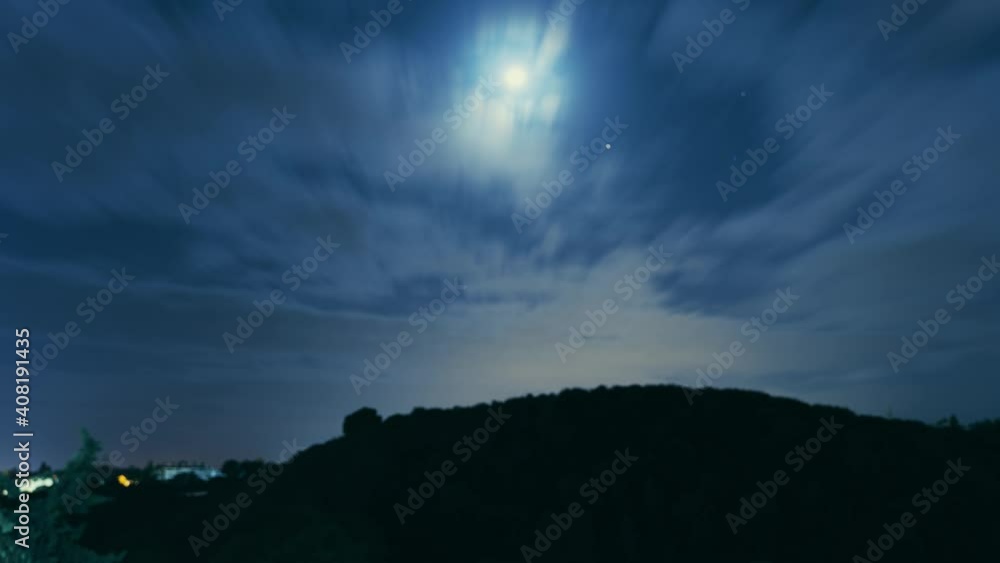 Fast night timelapse with the clouds and the moon Fast night timelapse with the clouds and the moon