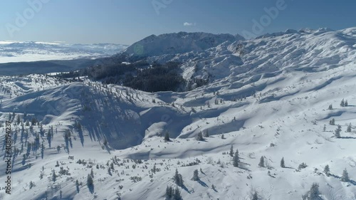 Wallpaper Mural flight over the snow-covered spruce forest with mountains in the background Torontodigital.ca