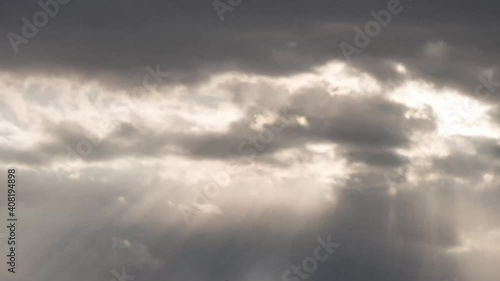 dark clouds cover the open sun. High quality 4k footage