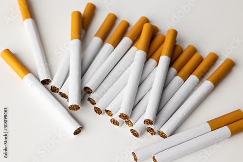 Many cigarettes stacked together. Drugs are harmful to the respiratory system.