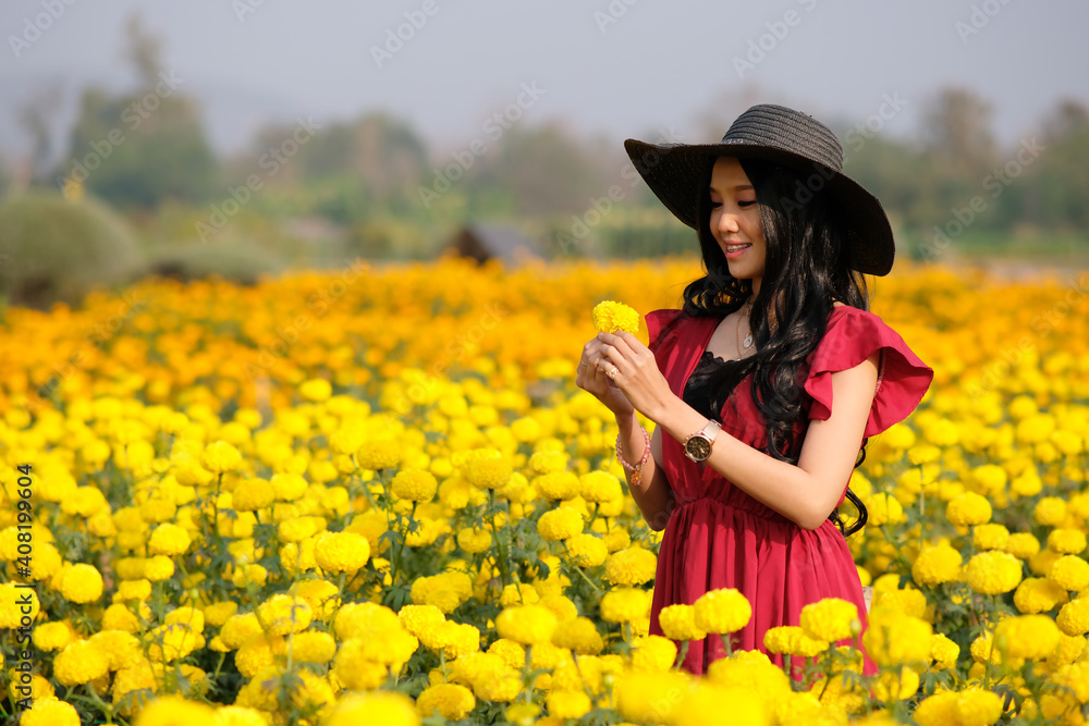 woman in a field of flowers woman in a field of flowers