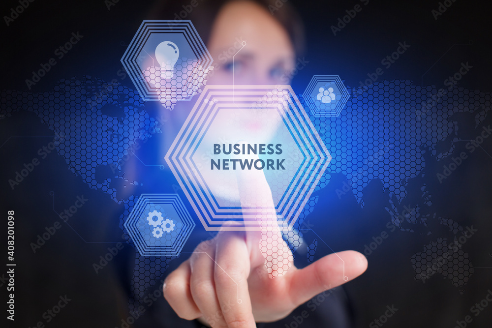 Business, Technology, Internet and network concept. Young businessman working on a virtual screen of the future and sees the inscription: Business network Business, Technology, Internet and network concept. Young businessman working on a virtual screen of the future and sees the inscription: Business network