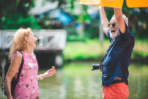 senior old couple celebrati...