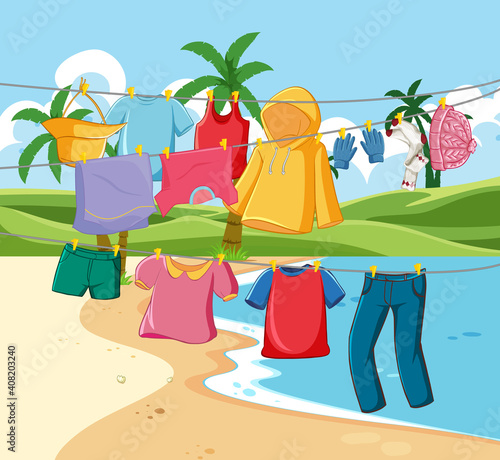 Many clothes hanging on a line in the beach scene