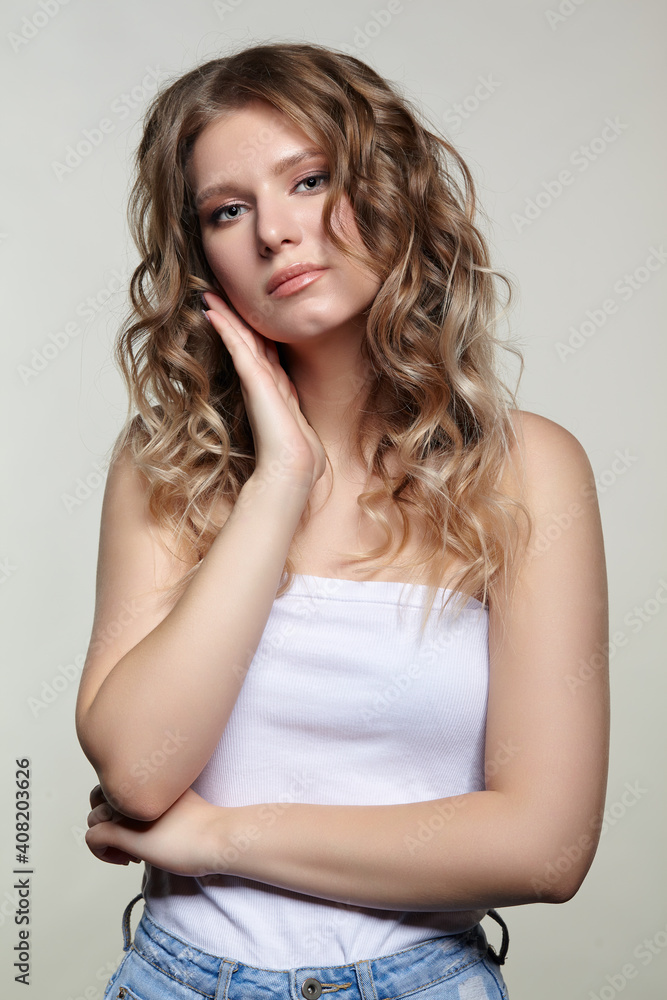 Fototapeta premium Portrait of young blonde woman.
