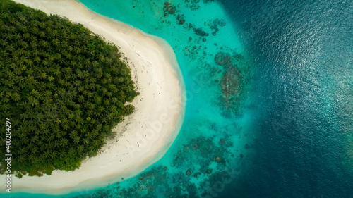 Fototapeta Naklejka Na Ścianę i Meble -  Aerial Drone Island Curve Ocean Meets Sandy Beach Tropical Seascape Birds Eye View