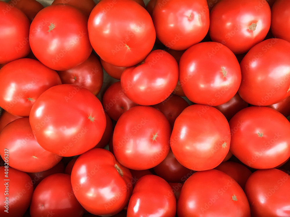 Tomatoes background. Red tomatoes. Ripe tomatoes. Tomatoes background. Red tomatoes. Ripe tomatoes.