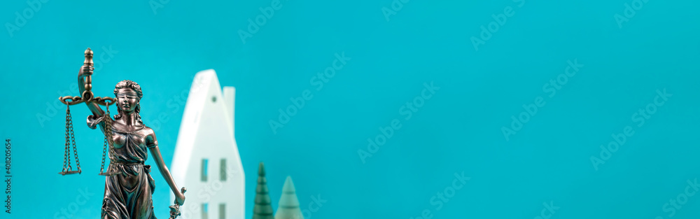 Obraz premium Lady Justice with house and Trees. Blue Panorama Banner. Symbol of real estate or landlord tenant law.