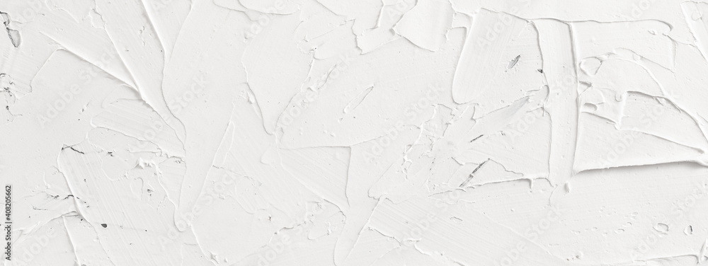 White abstract texture of surface covered with putty, panoramic image White abstract texture of surface covered with putty, panoramic image