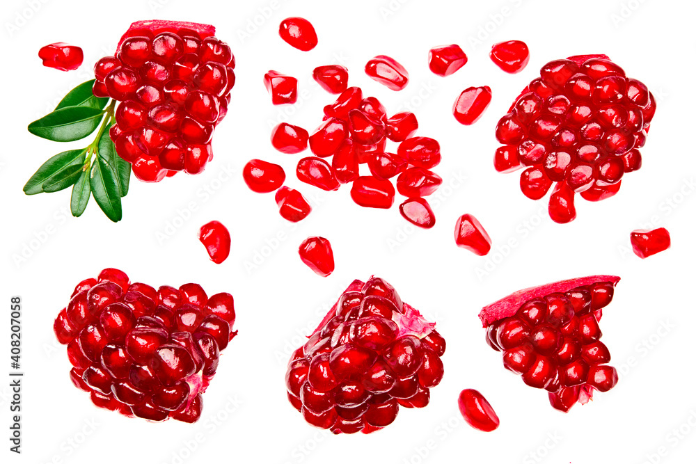 pomegranate seeds with green leaves isolated on white background. pomegranate berries. top view pomegranate seeds with green leaves isolated on white background. pomegranate berries. top view