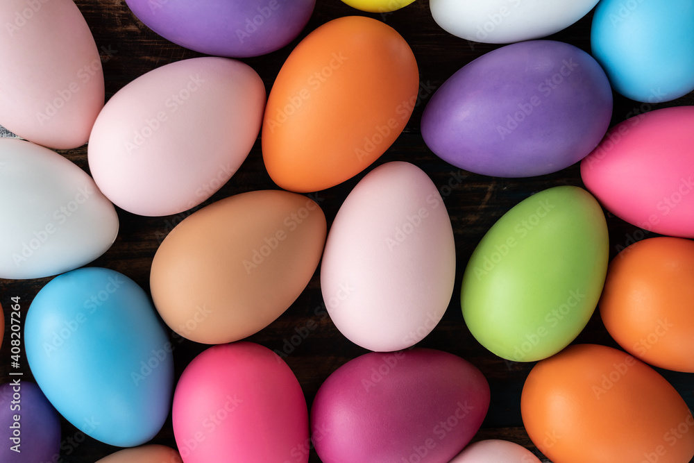 Easter eggs on wooden background with copy space,Colorful and handmade paint on eggs for easter day traditional in Europe,Easter Day Concept Easter eggs on wooden background with copy space,Colorful and handmade paint on eggs for easter day traditional in Europe,Easter Day Concept