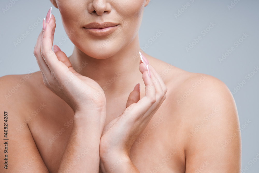 Portrait of beautiful woman on gray background Portrait of beautiful woman on gray background