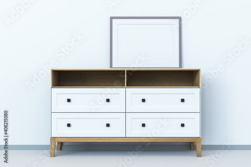 3D illustration. White modern chest of drawers with wooden accents. Natural light pastel colors interior. Laptop and mockup frame on the furniture. Scandinavian style. Neutral background.  © Richard Salamander