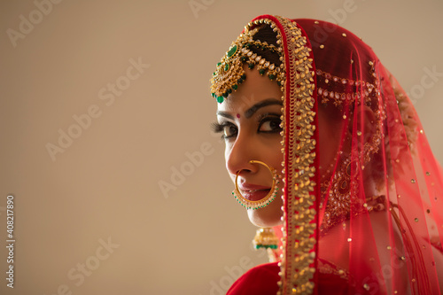 Indian bride looking back 	 photo