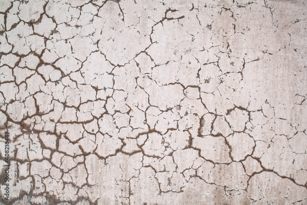 An old wall with cracks. Background image. An old wall with cracks. Background image.