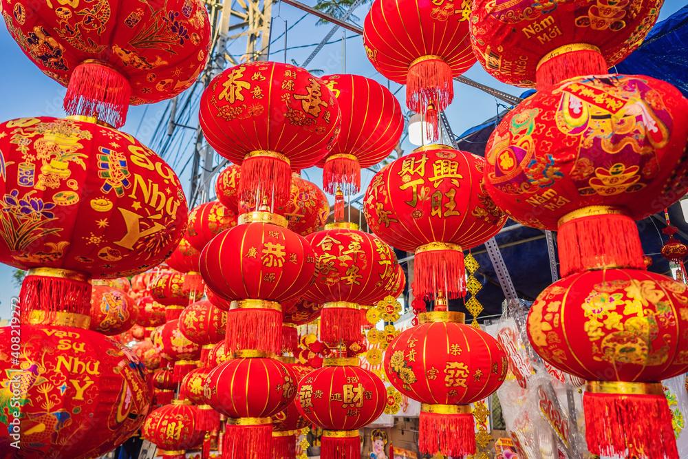 Decoration item for Lunar new year. TEXT TRANSLATION from Vietnamese and Chinese: Congratulations on the Vietnamese, Chinese New Years and wishes of all the best in the New Lunar Year