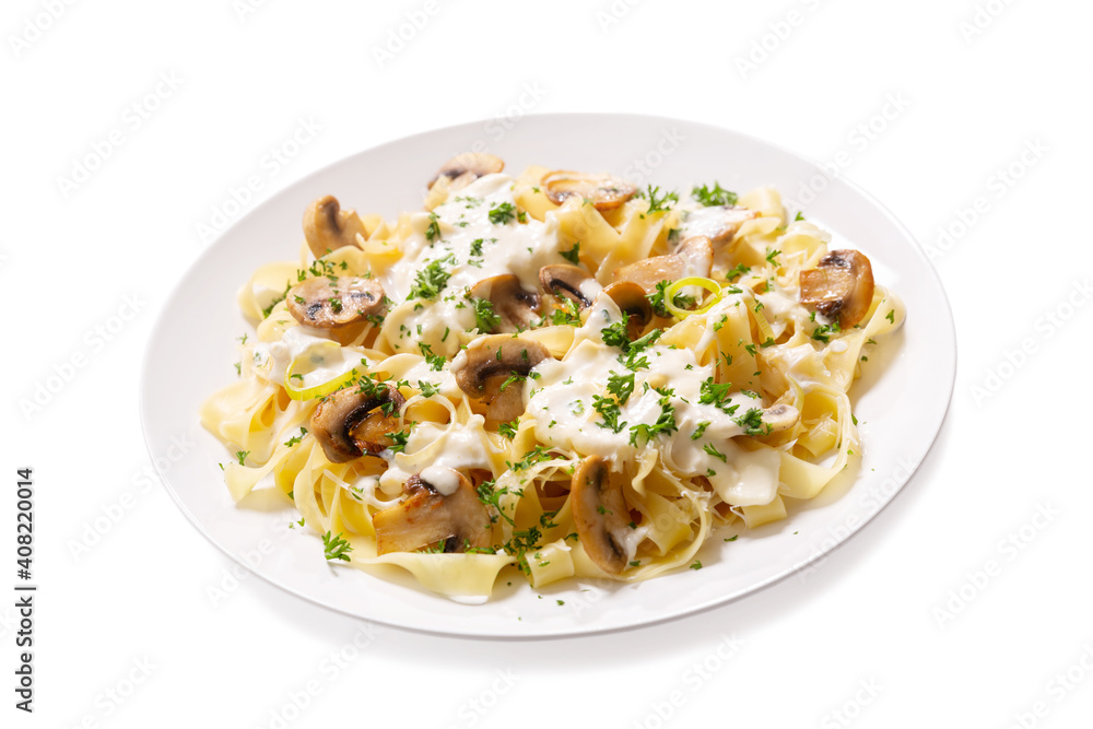 plate of pasta with cream sauce and mushrooms on a white background plate of pasta with cream sauce and mushrooms on a white background