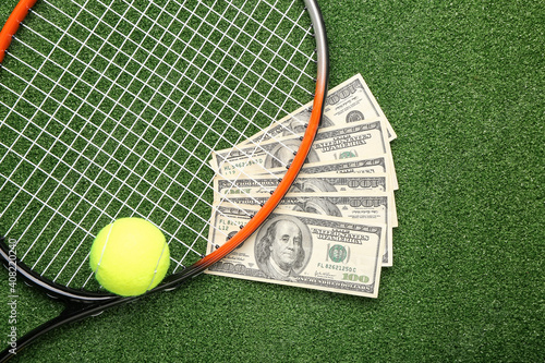 Obraz na płótnie Money, tennis rocket and ball on color background
