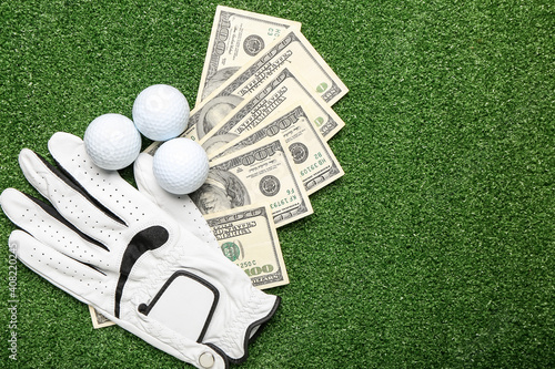 Print op canvas Money, golf glove and balls on color background