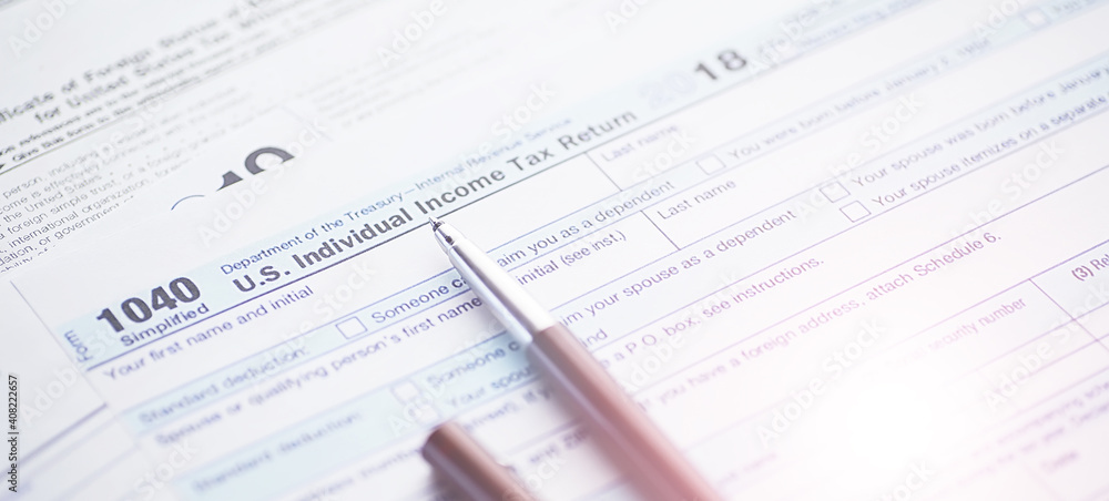 Annual tax reporting. Tax form on the table. Financial statements for signature. Annual tax reporting. Tax form on the table. Financial statements for signature.