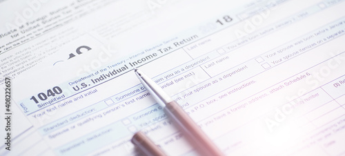 Wallpaper Mural Annual tax reporting. Tax form on the table. Financial statements for signature. Torontodigital.ca