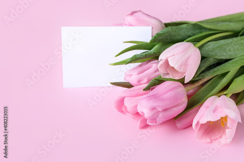 Fototapeta Naklejka Na Ścianę i Meble -  Beautiful flowers and blank card on color background
