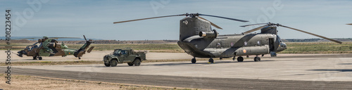 Barcelona, Spain; August 7, 2017: Big green armed spanish army helicopter.  Tiger, ch-47 and anibal suv