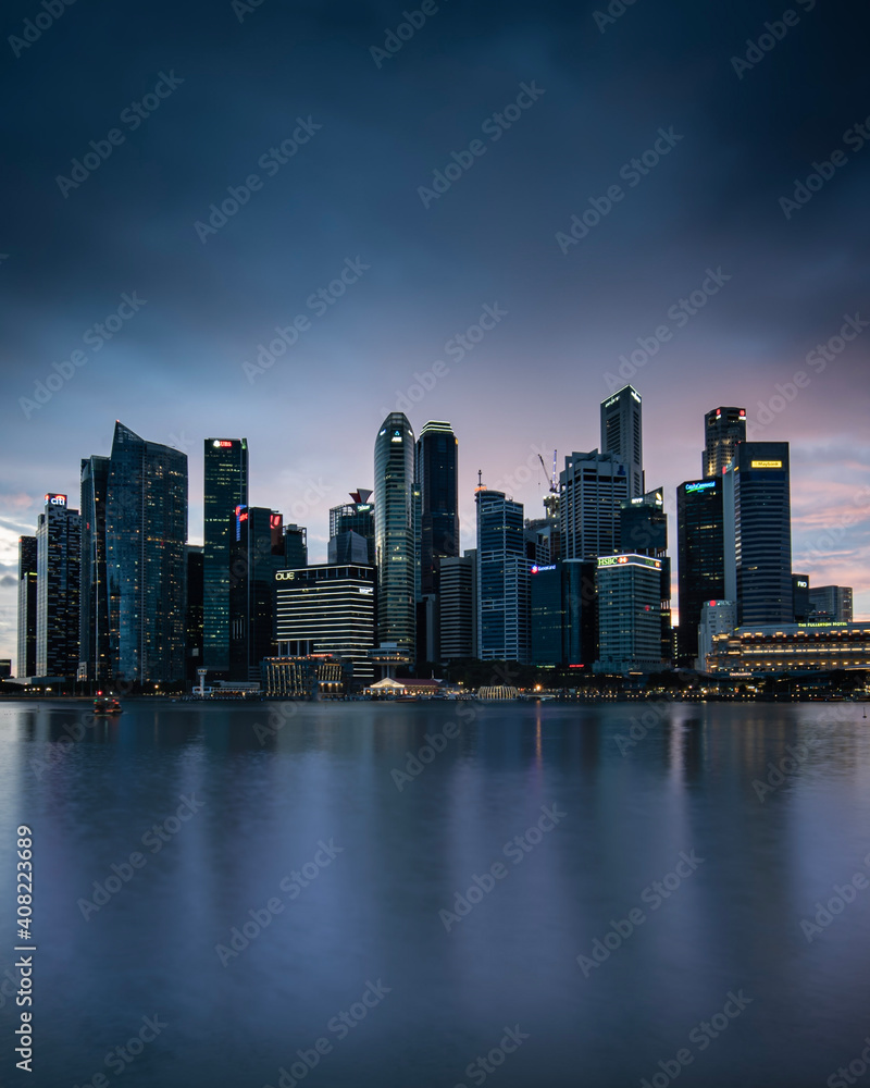Singapore city skyline at night blue hour