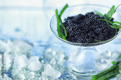 Fresh black fish roe. Beluga caviar served with ice.