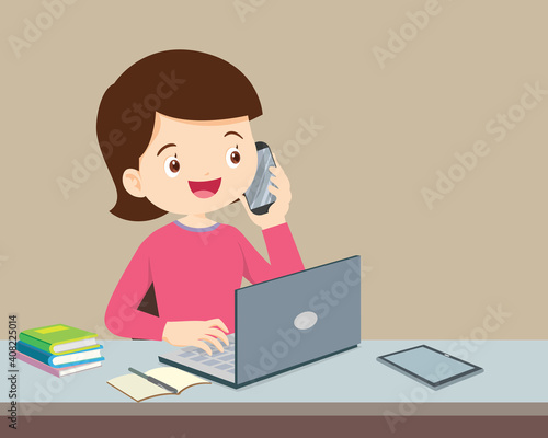 Young woman using a personal computer and mobile phone