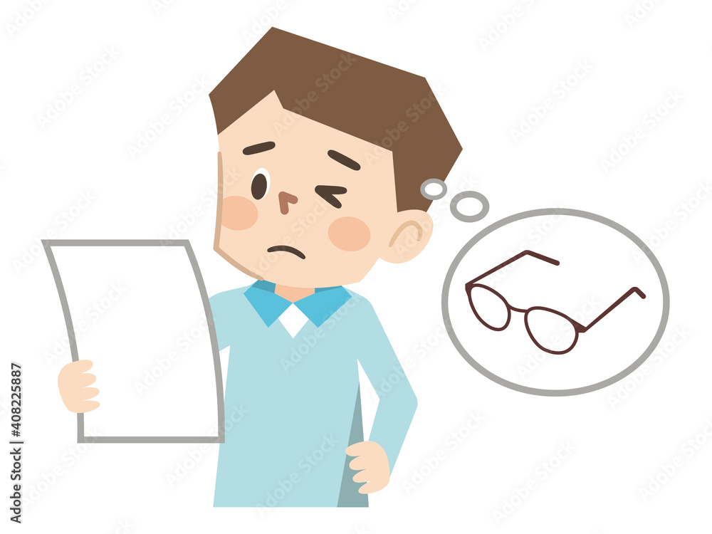 文字が読みにくい老眼の男性