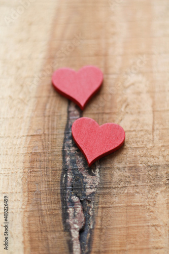 Two red Hearts for Valentine s day concept on wood background. Love background