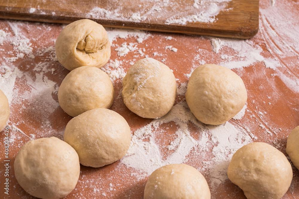Prepared dough balls for home baking. Home hobby Prepared dough balls for home baking. Home hobby