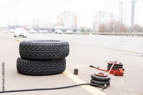 Equipment for car service and repair, tire machine for balancing automotive wheels, balancing stand, closeup