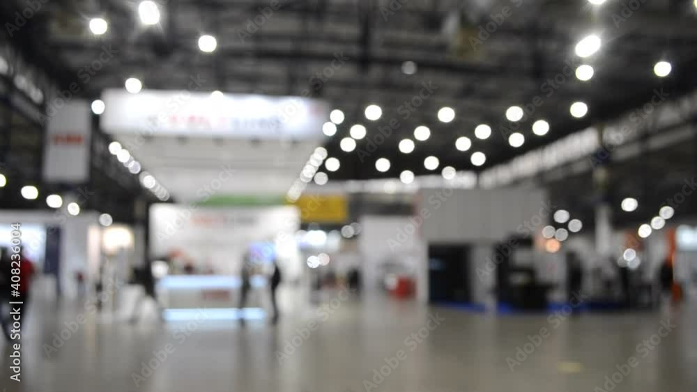 Blurred background. Inside big empty building with high ceiling. Blurred background. Inside big empty building with high ceiling.