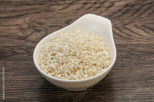 Raw arborio rice for Risotto photo