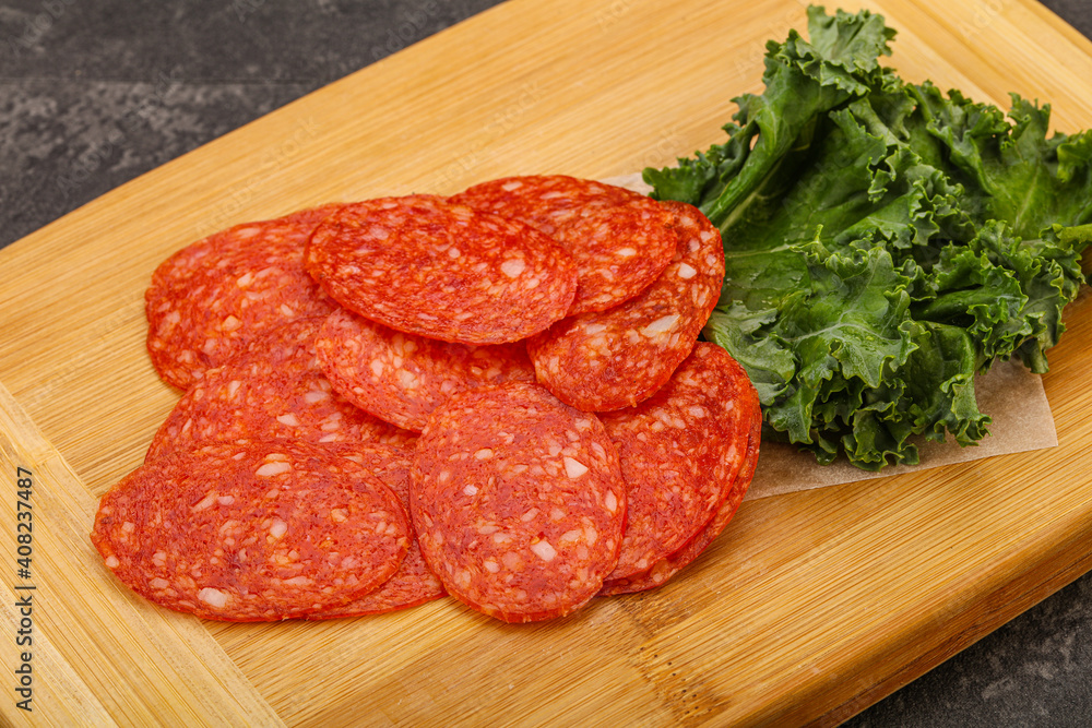 Italian spycy pepperoni sausage slices Italian spycy pepperoni sausage slices